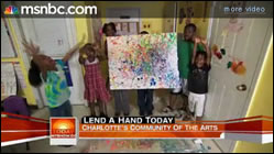 Kids at the Community School of the Arts in Charlotte, NC show off their artwork.