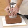 Push Canister into Wedged Clay